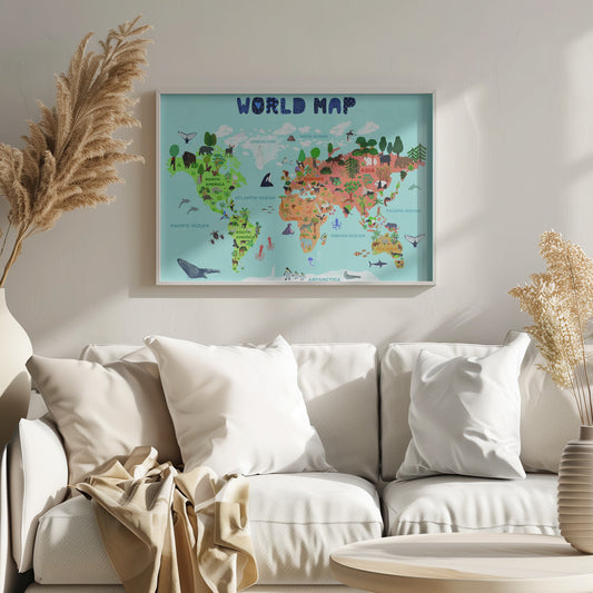 A colorful, illustrated world map for children, featuring continents populated with their native animals and plants. The map is set against a light blue ocean background with the title 'WORLD MAP' at the top in a playful blue font, all enclosed in a silver frame. Artwork