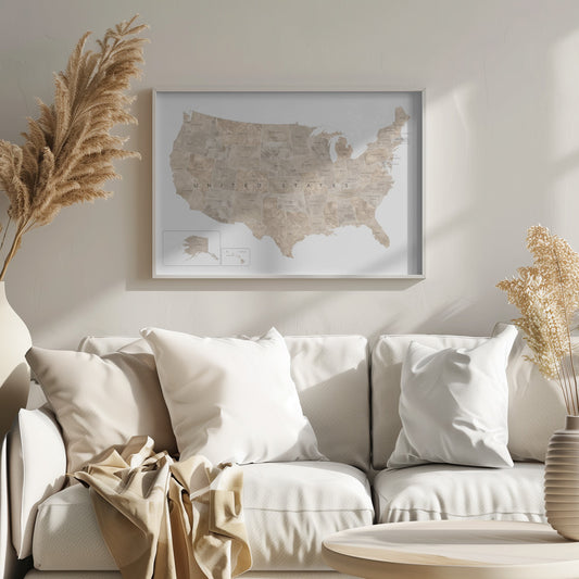 A framed map of the United States with a textured, marbled design in shades of brown and tan. Each state is outlined and labeled, and the words 'UNITED STATES' are displayed across the center. Alaska and Hawaii are shown in separate insets. The map is set against a white background and enclosed in a light gray frame. Artwork