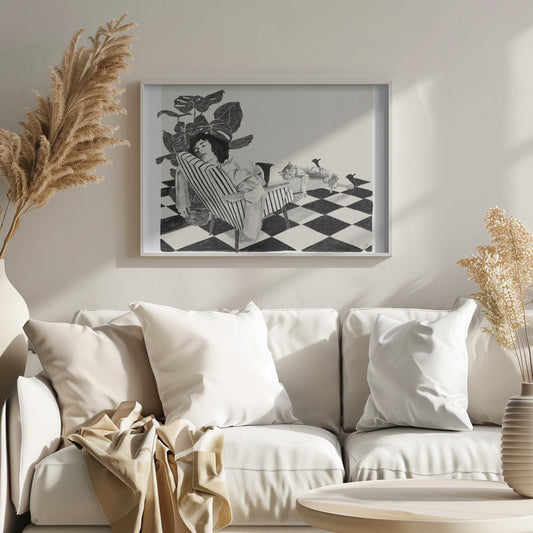 A black and white sketch of a woman with short dark hair sleeping in a striped armchair. A large potted plant is behind her, and a cat is sleeping stretched out across her legs. The floor has a black and white checkerboard pattern. Decor