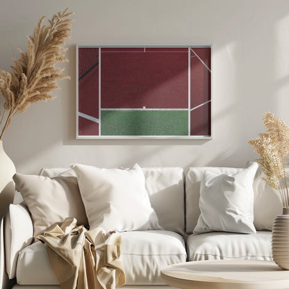 An abstract, framed triptych photograph showing an overhead view of a sports court. The image is divided into panels, featuring geometric blocks of deep red and green court surfaces, intersected by clean white boundary lines and a glimpse of a black net. Decor