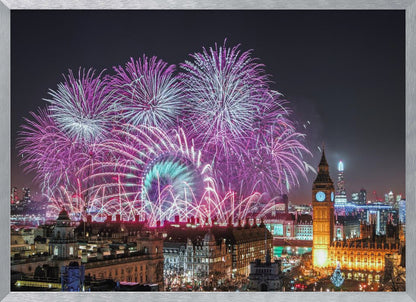 A vibrant night-time cityscape of London featuring a massive fireworks display in purple, pink, and white exploding over landmarks like the London Eye and the illuminated Big Ben clock tower, all within a silver frame. Decor
