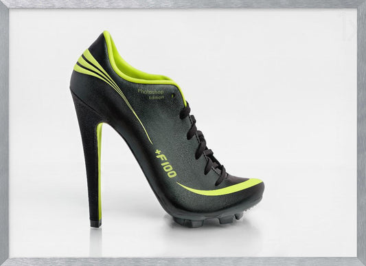 A conceptual piece of digital art featuring a hybrid shoe that is part black soccer cleat and part stiletto high heel. The shoe has neon lime green accents and is displayed against a stark white background inside a silver frame. Decor
