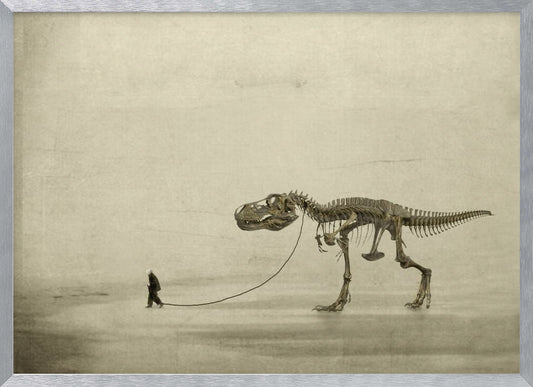 A surreal, sepia-toned artwork depicting a small man in a dark coat walking a massive Tyrannosaurus Rex skeleton on a leash against a minimalist, textured beige background, all within a silver frame. Wall Art