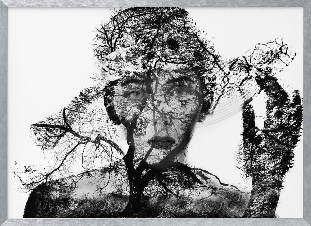 A surreal black and white double exposure artwork in a silver frame. The image combines a close-up portrait of a person's face with the intricate silhouette of bare, branching trees against a white background, creating a complex and thought-provoking visual. Poster