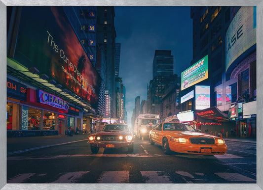 A cinematic night-time view of a busy city street, likely Times Square, with a vintage red muscle car and a yellow taxi cab side-by-side in the foreground, surrounded by towering skyscrapers and glowing neon billboards. Artwork