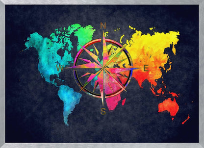 An artistic world map in a silver frame, featuring continents in a vibrant rainbow watercolor style against a dark, textured navy blue background. A large, ornate, and colorful compass rose is superimposed in the center of the map. Artwork