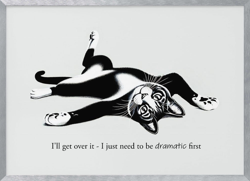 A framed black and white illustration of a tuxedo cat lying playfully on its back. Below the image is the text, 'I'll get over it - I just need to be dramatic first'. Artwork