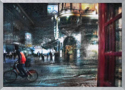 An abstract, moody digital artwork of a bustling London street at night. The scene has a layered, textured look with motion blur, featuring a cyclist in a red vest, the illuminated sign for 'The Nag's Head' pub, and a classic red telephone booth in the foreground, all within a silver frame. Wall Art