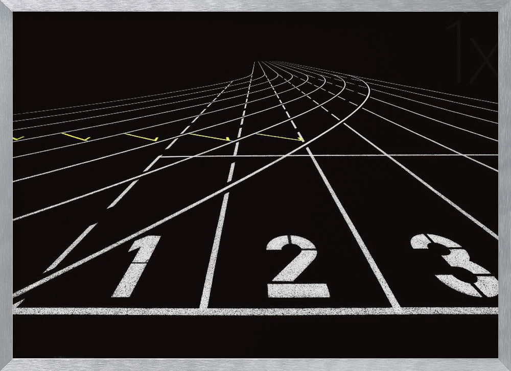 A framed, high-contrast graphic of a black running track from a low-angle perspective at the starting line. White lines delineate the lanes, with the numbers 1, 2, and 3 stenciled in the foreground. The track curves and recedes into the distance, creating a strong sense of perspective. Decor