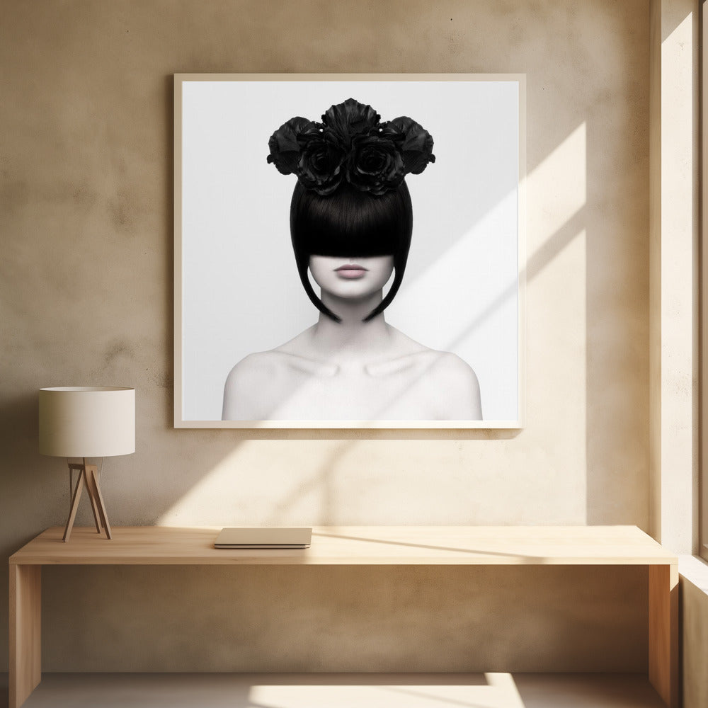 A stylized black and white portrait of a woman with a sleek black bob hairstyle where the bangs completely cover her eyes. She wears a large, elaborate headpiece made of black roses. Her expression is neutral, showing only her mouth and chin. The image is set against a plain white background and enclosed in a light wood frame. Print