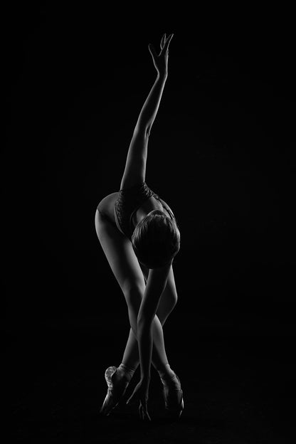 string. the ballerina is standing on pointe shoes leaning forward and wrapping her arm around - Poster / Art Print