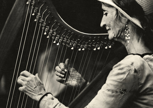 Playing the Harp - Poster / Art Print